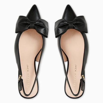 Black bow flats with &