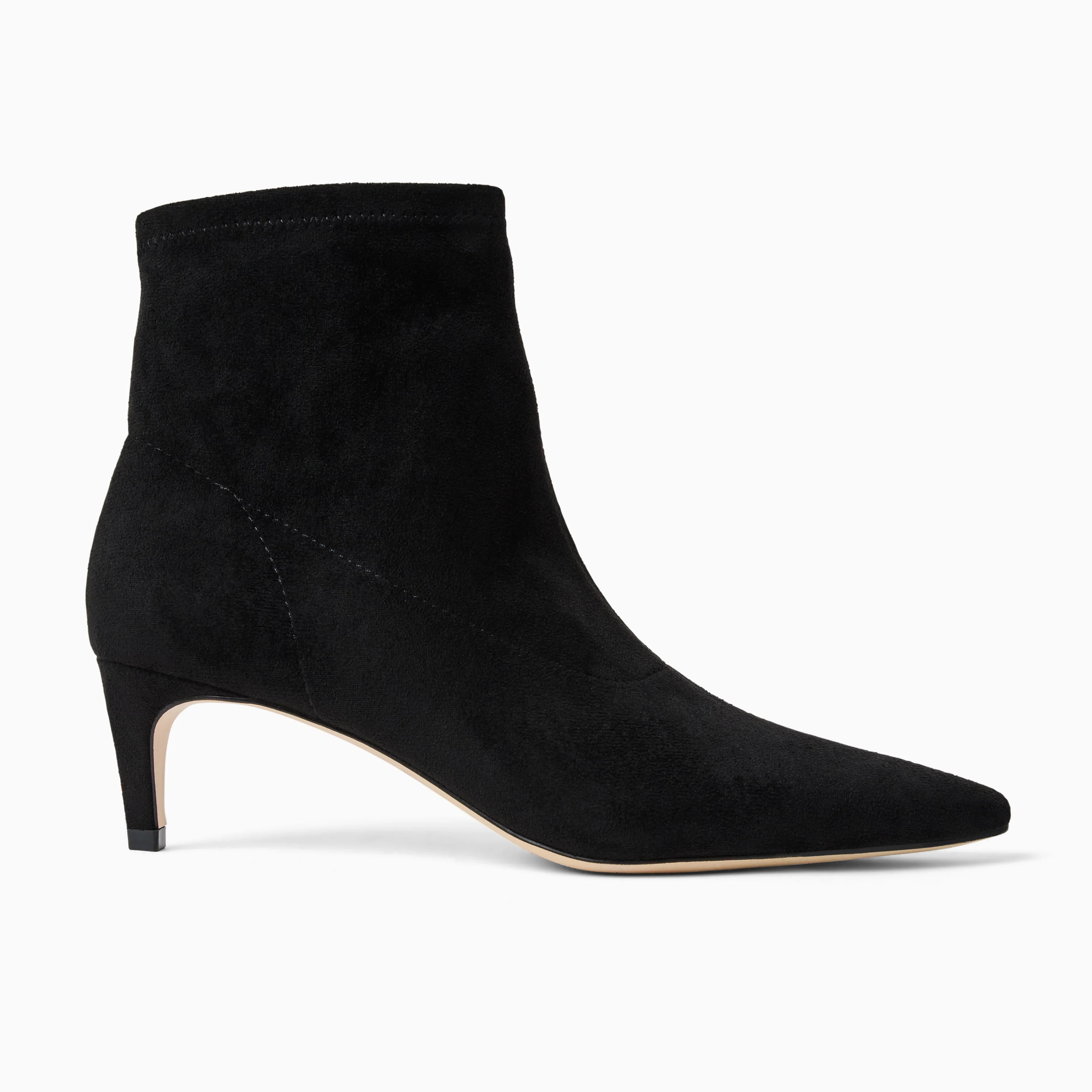 Black ankle boot on a white background