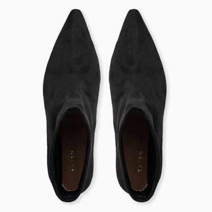 Pair of black pointed-toe shoes on a white background