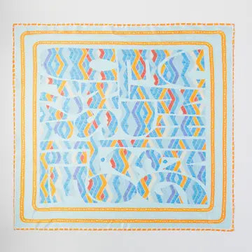 Colorful blue geometric patterned square bandana scarf with a blue border