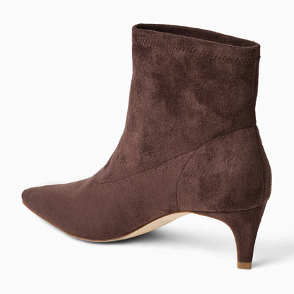 Brown suede ankle boot on a white background