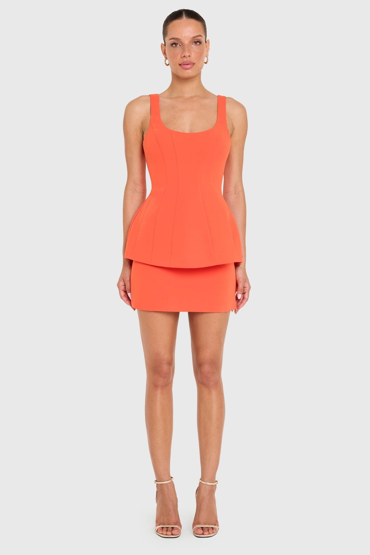Amanda Uprichard Empire Dress in Mandarin, flowy sleeveless design with a fitted waist, perfect for elegant occasions.
