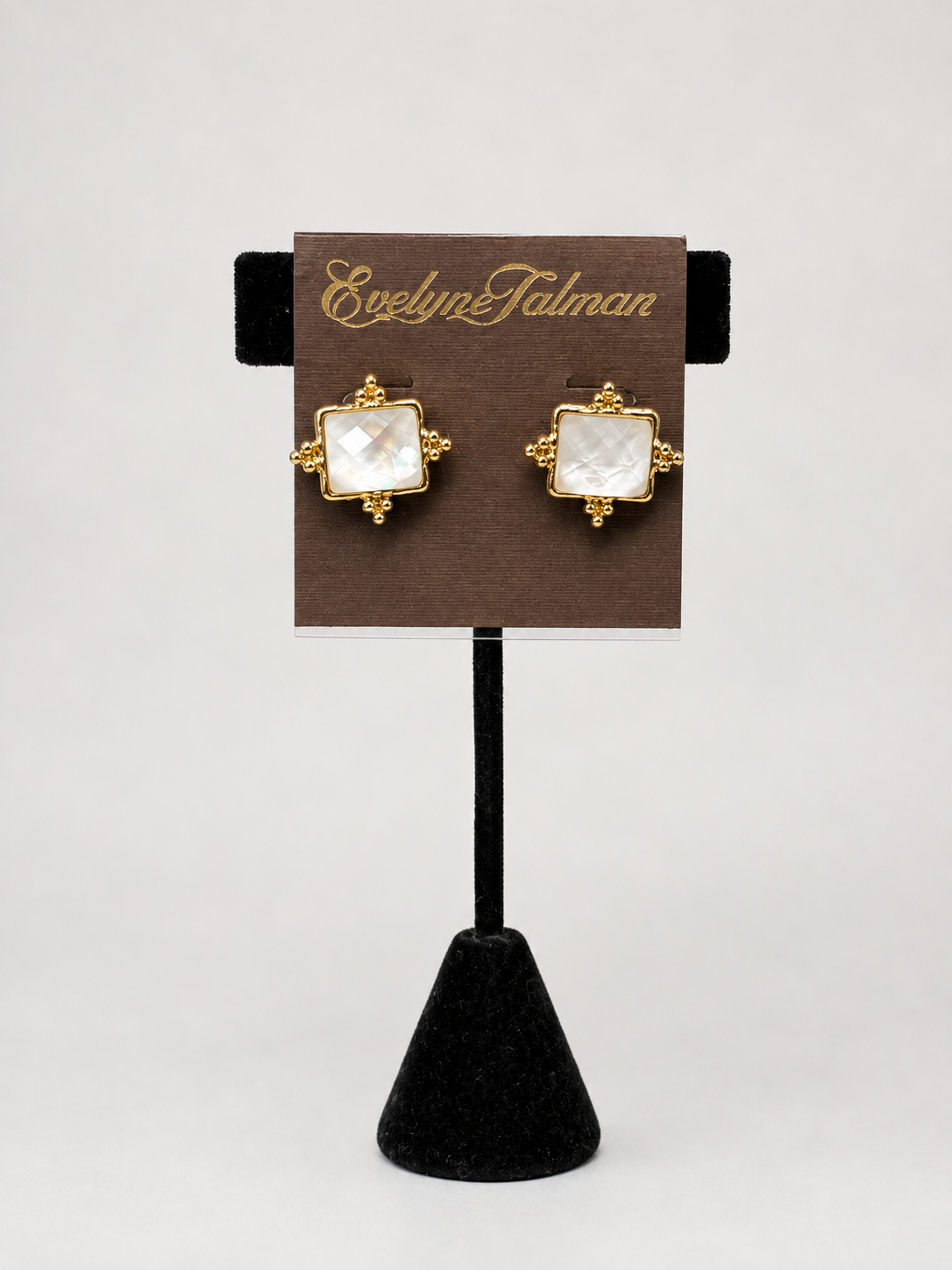 Caroline hill Kerang Square Facited Stud Earring White a pair of gold-tone stud earrings with square white mother-of-pearl centers.