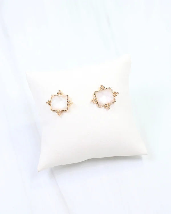 Caroline hill Kerang Square Facited Stud Earring White a pair of gold-tone stud earrings with square white mother-of-pearl centers.