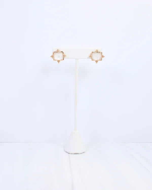 Caroline hill Kerang Square Facited Stud Earring White a pair of gold-tone stud earrings with square white mother-of-pearl centers.