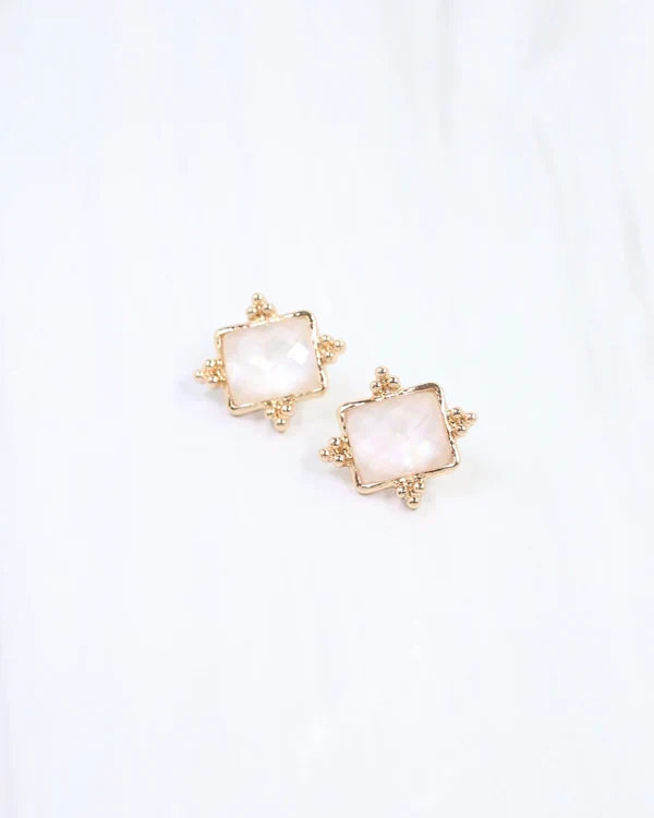 Caroline hill Kerang Square Facited Stud Earring White a pair of gold-tone stud earrings with square white mother-of-pearl centers.
