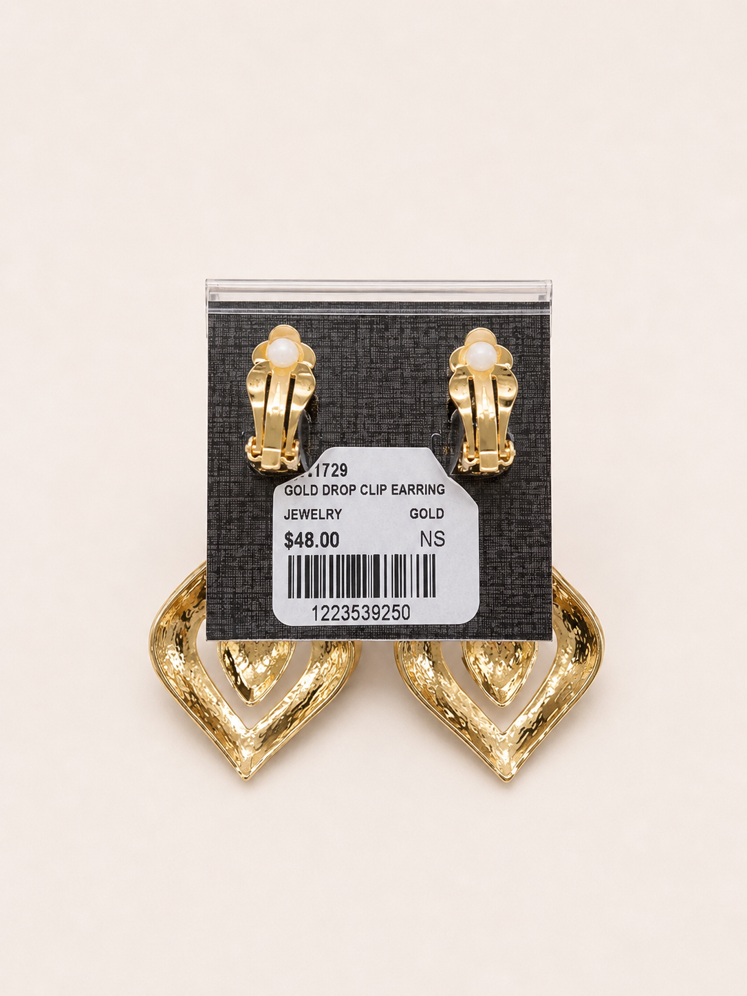 Cutout Geometric Drop Clip-on Earrings pair of gold statement drop earrings with a geometric, layered marquise-like design