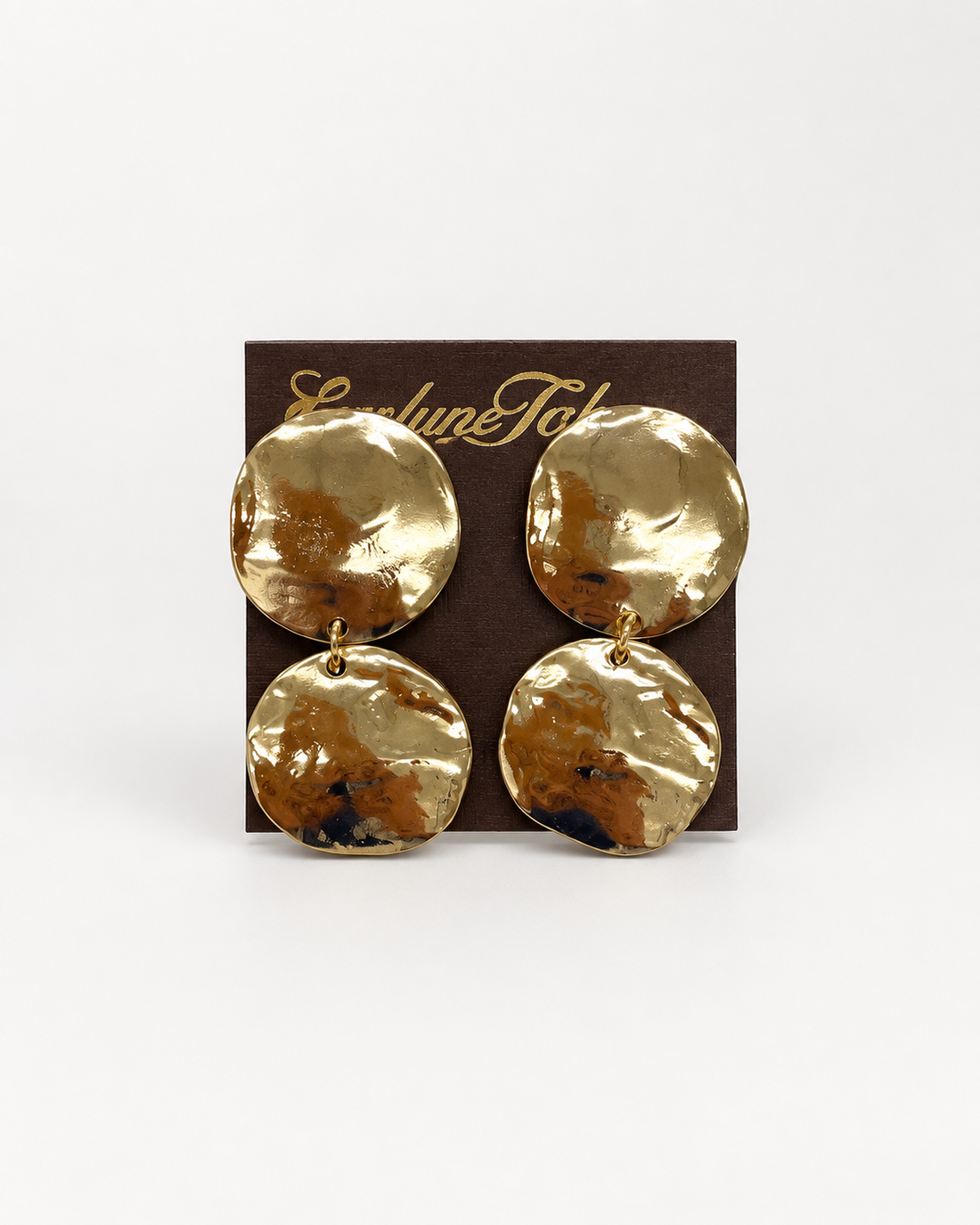 Gold Hammered Clip-on Earring pair of chunky gold disc drop earrings with a hammered texture.