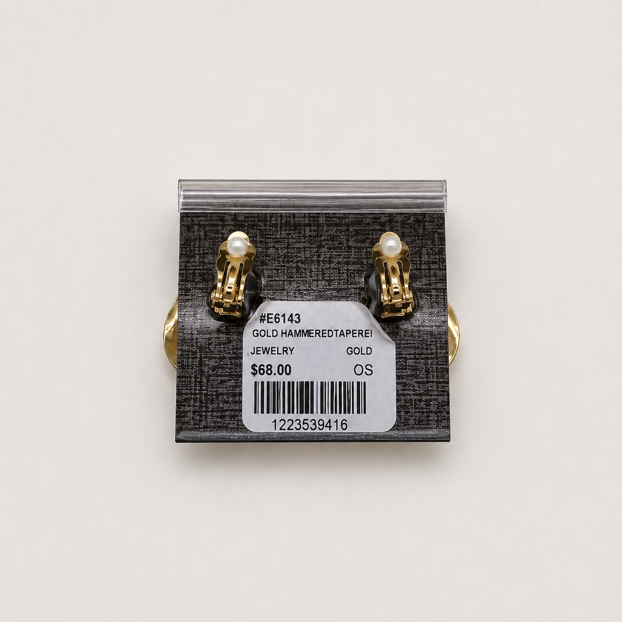 Gold Hammered Disc Drop Clip-on Earrings a pair of gold-tone disc earrings with textured bands.