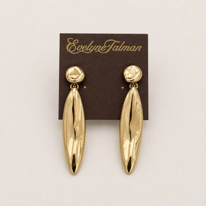 A pair of gold drop earrings with textured teardrop-shaped dangles and round stud top.