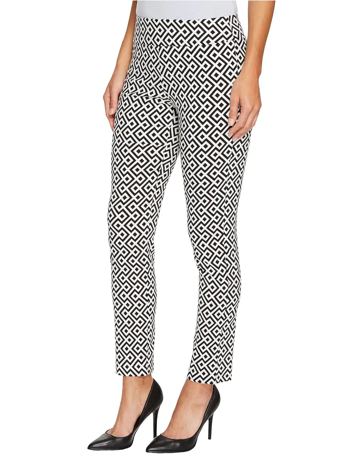 Black and white geometric patterned pants on a white background