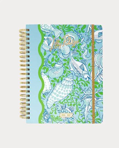 Lilly Pulitzer 2026-2027 17 Month Jumbo Agenda Spiral-bound planner with a decorative cover featuring sea shells and fish in the Color Day Dream Blue Throw Me A Line
