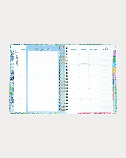 Lilly Pulitzer 2026-2027 17 Month Jumbo Agenda Spiral-bound planner with a decorative cover featuring sea shells and fish in the Color Day Dream Blue Throw Me A Line