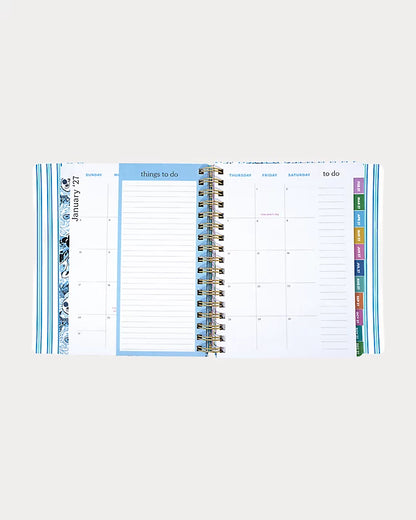 Navy blue Lilly Pulitzer 2026-2027 17 Month Leatherette Agenda with white shell patterns in Resort White Shell Shine