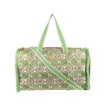 A Lilly Pulitzer Duffle Tote, Tropical Tiles tote bag with a green and pink citrus slice pattern, featuring pale green handles and a small gold-tone Lilly Pulitzer logo plaque. 