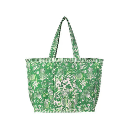 Lilly Pulitzer Reversible Quilted Ruffle Tote, Covent Garden green and white tropical botanical print tote bag with ruffled trim and long shoulder straps.