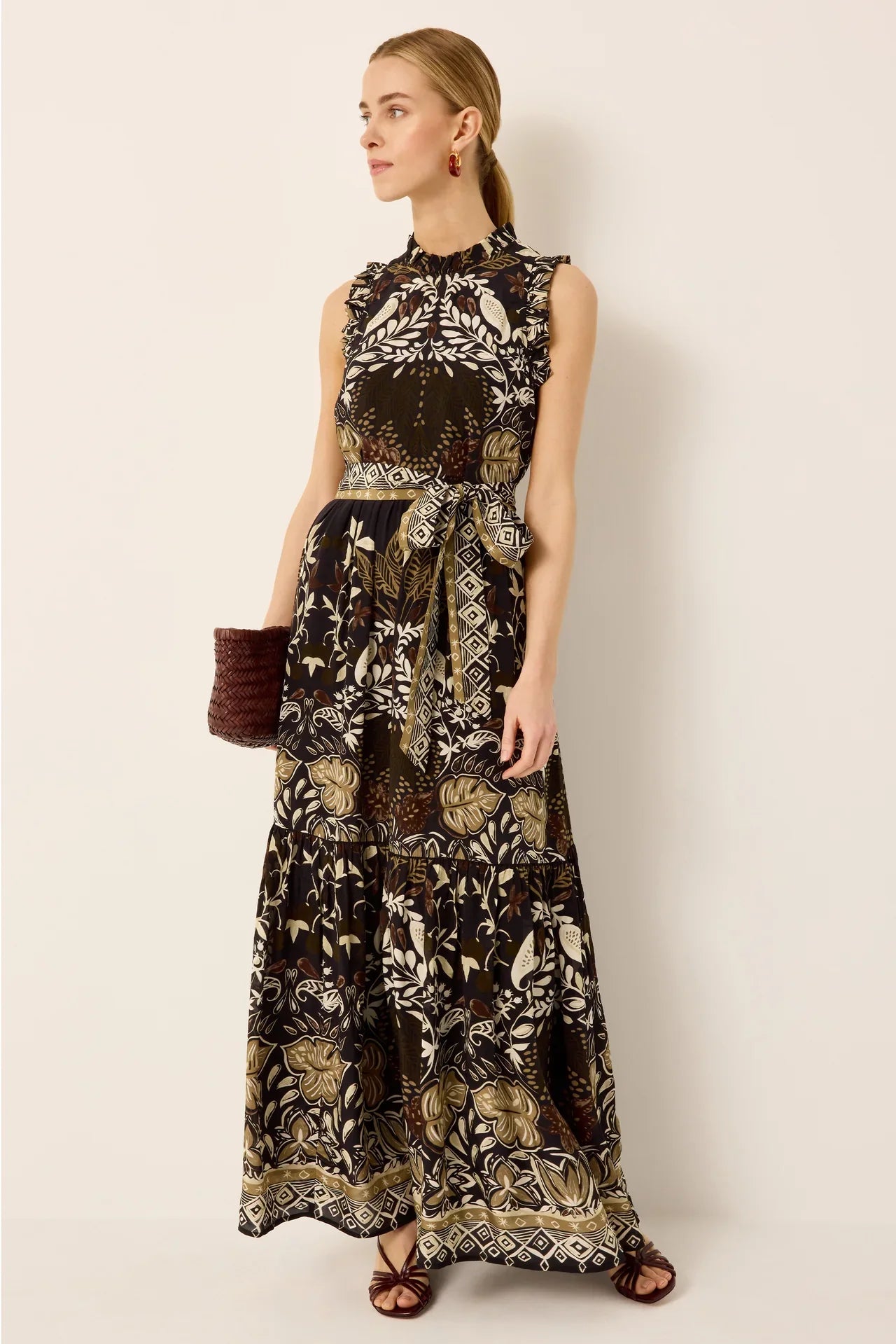 Marie Oliver Alice Dress in Twilight, elegant dress with flowing fabric and fitted waist, showcased on a model.