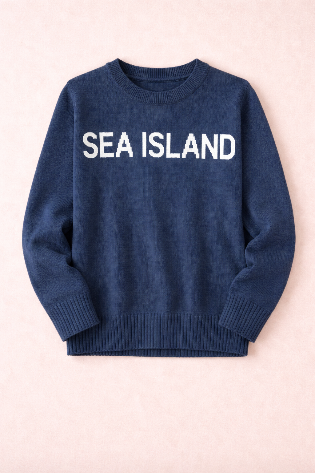 Navy Pink Pineapple Classic Sea Island Sweater with Sea Island text, soft knit fabric, and ribbed cuffs.