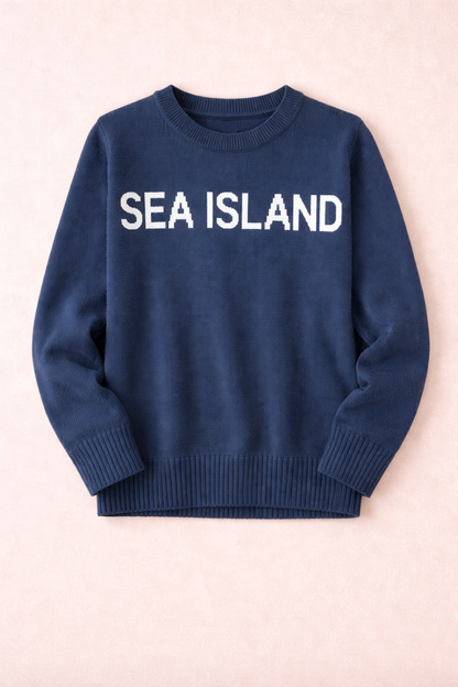 Navy Pink Pineapple Classic Sea Island Sweater with Sea Island text, soft knit fabric, and ribbed cuffs.