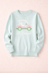 Pink Pineapple St Simons golf cart sweater in pastel colors, featuring a charming golf cart design, perfect for casual wear.