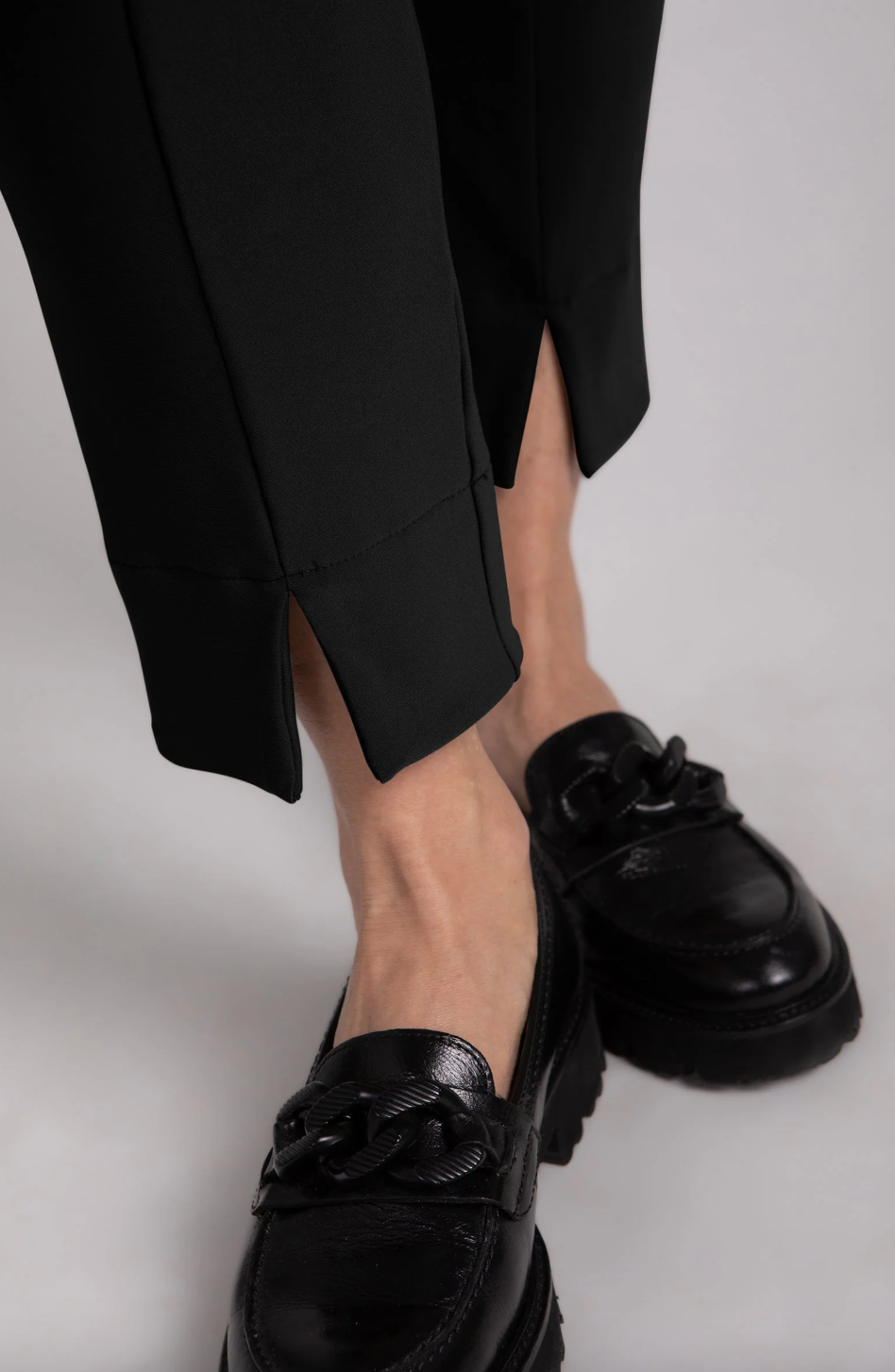 Black Hepburn ankle pants by SYMPLI, featuring a tailored fit and stylish design, perfect for casual or professional wear.