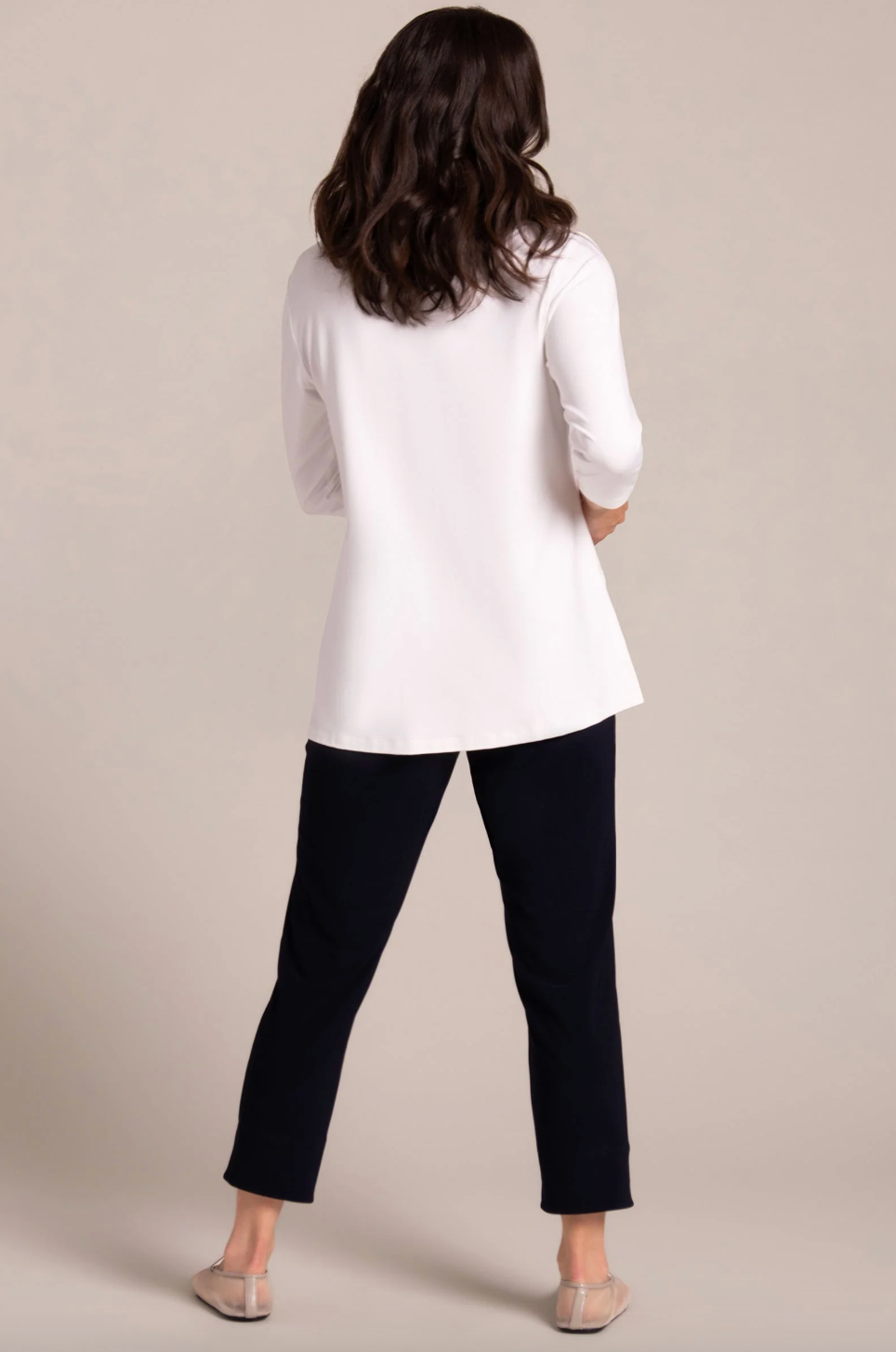 White Weekender Top by SYMPLI, casual sleeveless blouse with relaxed fit, displayed on a hanger.