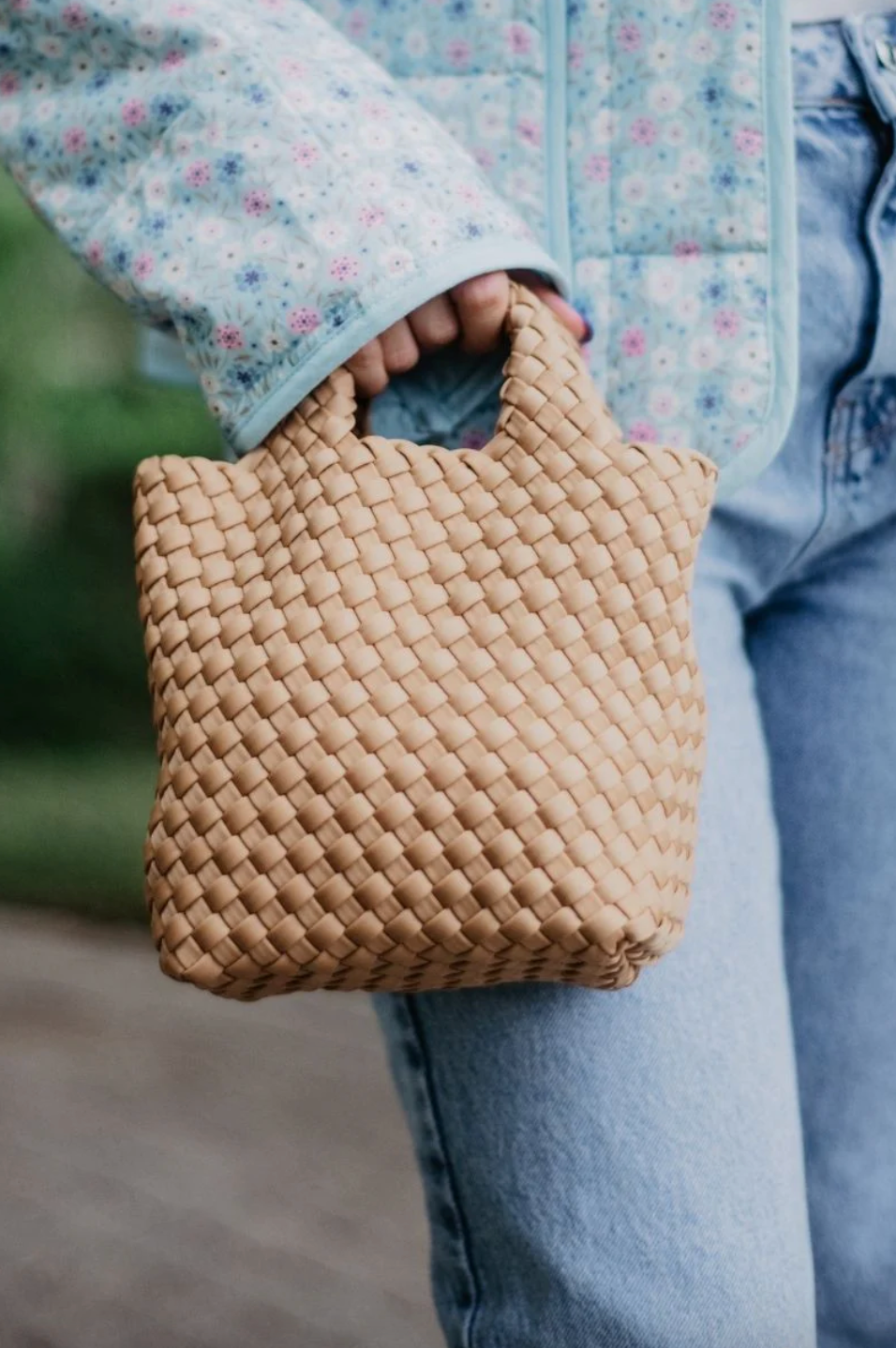 KATYDID neoprene braided clutch bag with sleek design, featuring a compact, stylish handbag for versatile evening or casual use.