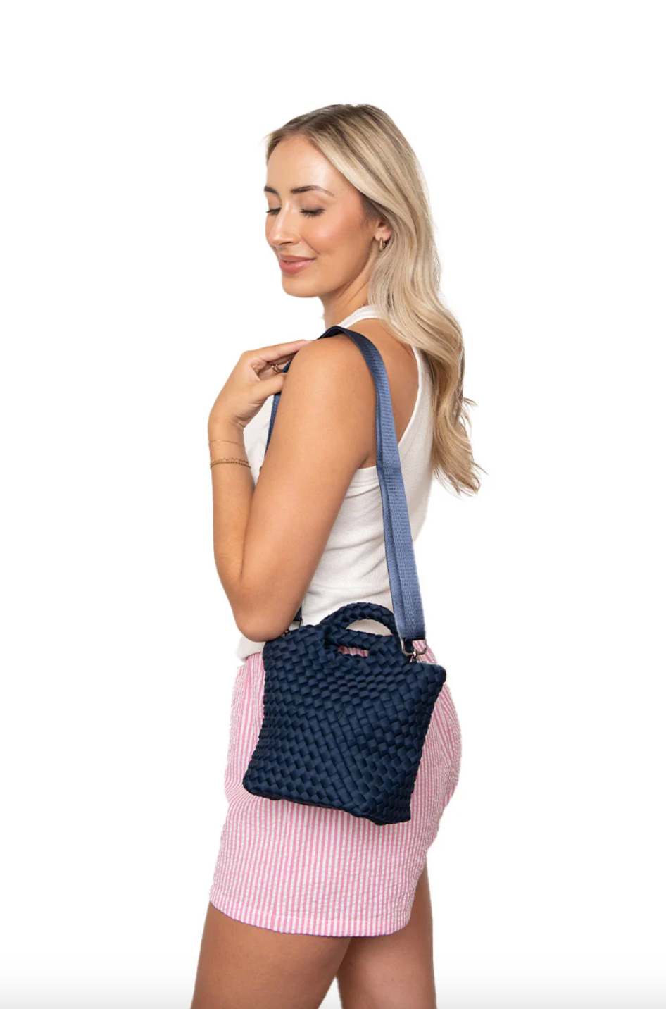 KATYDID neoprene braided clutch handbag with sleek design and textured braided detail, perfect for stylish occasions.