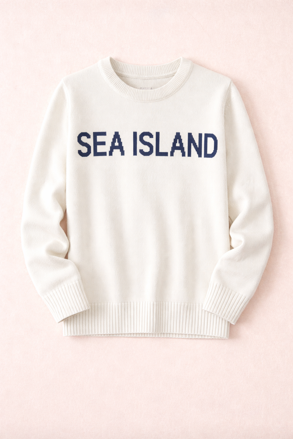 Pink Pineapple Classic Sea Island Sweater featuring a cozy crewneck in soft, textured fabric, perfect for casual wear.