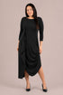 A woman modeling a black three-quarter sleeve midi dress with draped side detail and a high-low hem Sympli Drama Dress 3/4 Sleeves in Black
