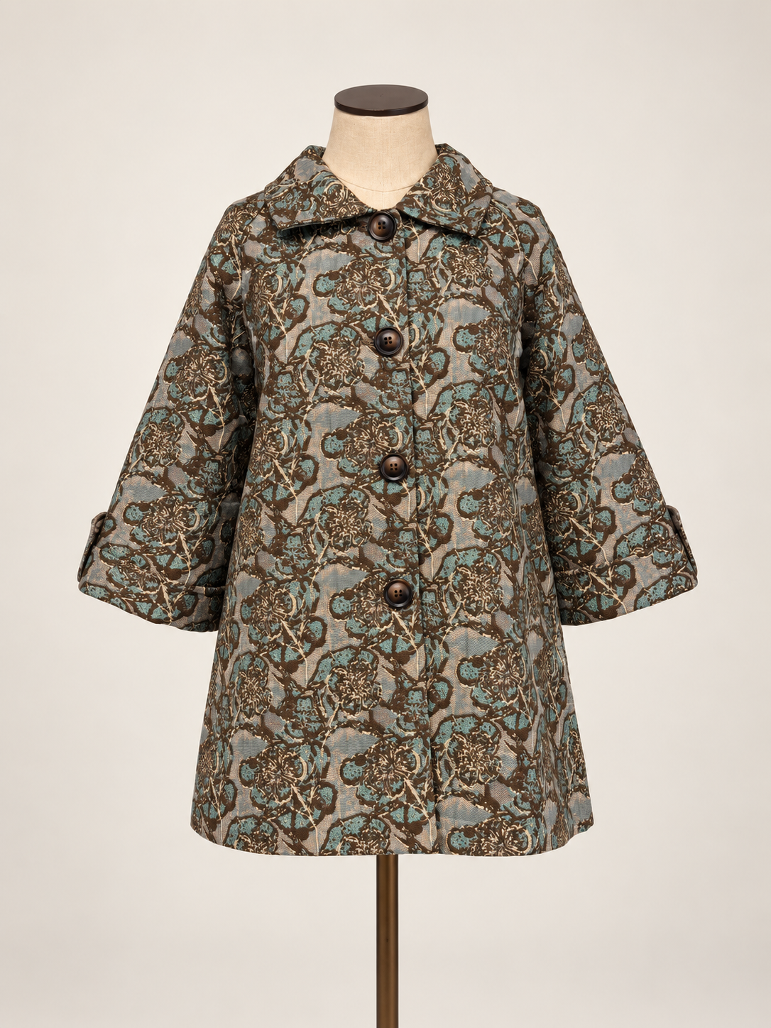 Taupe &amp; Teal Brocade Jacket a short-sleeved button-front coat with an intricate brown, beige, and gray paisley pattern.