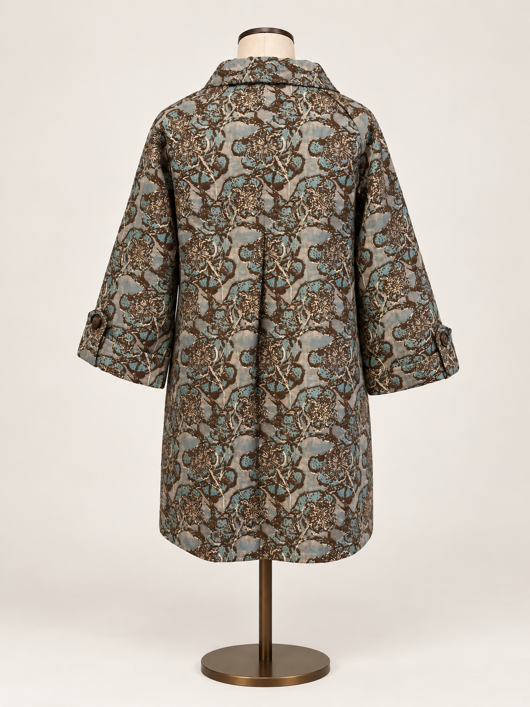 Taupe &amp; Teal Brocade Jacket a short-sleeved button-front coat with an intricate brown, beige, and gray paisley pattern.