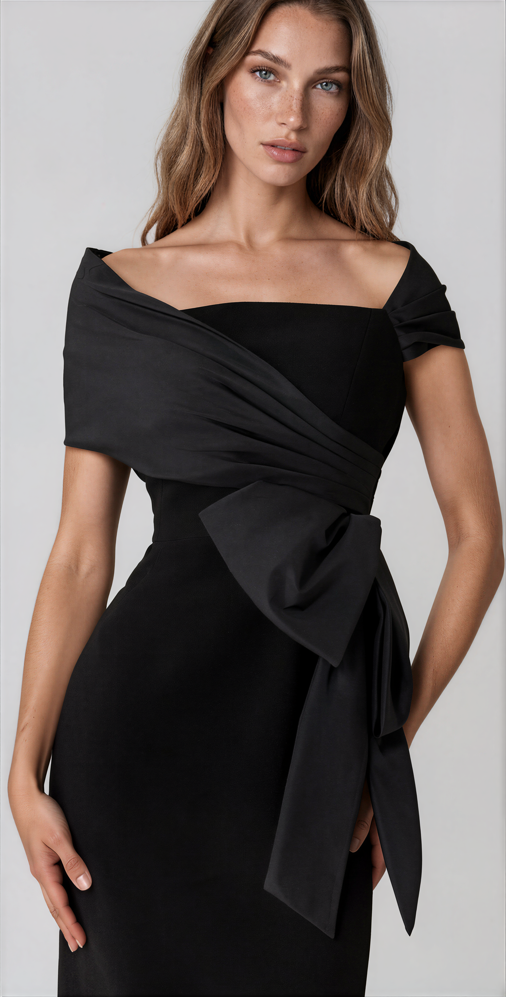 Teri Jon 267226BLK-0 Taffeta and Crepe Bow Sheath Dress black off-the-shoulder midi dress with a large draped waist bow.