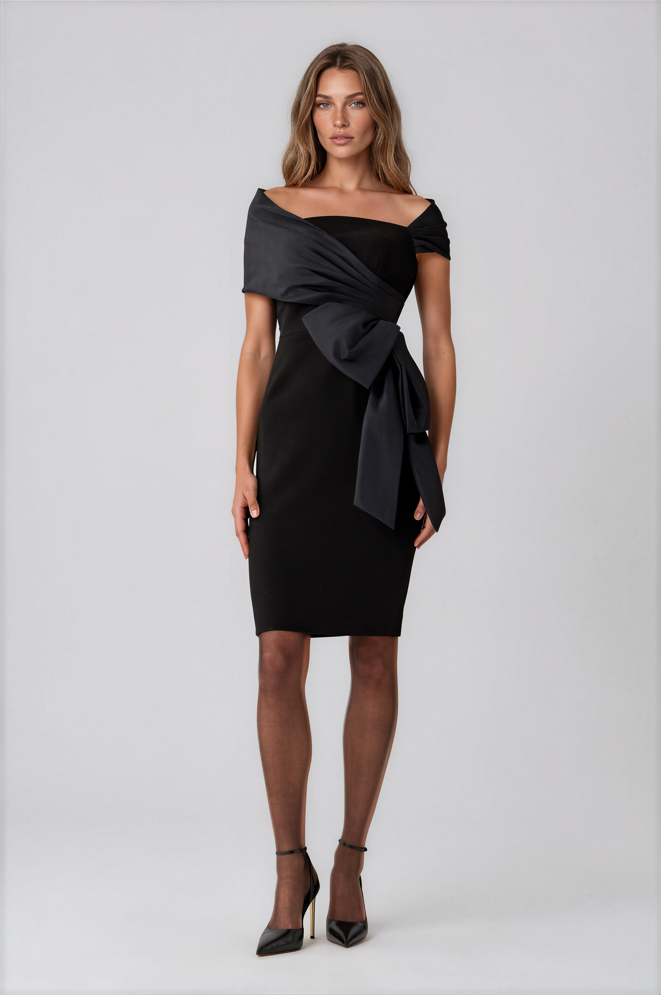 Teri Jon 267226BLK-0 Taffeta and Crepe Bow Sheath Dress black off-the-shoulder midi dress with a large draped waist bow.