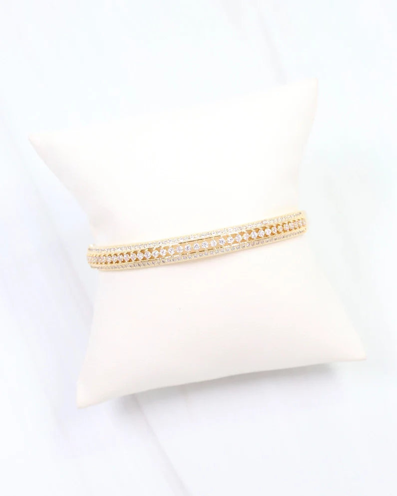 Gold bracelet with lined in cz