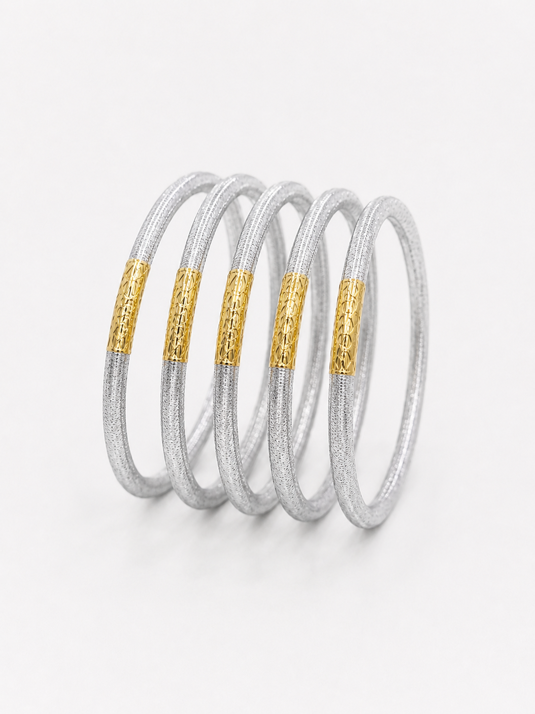 Five silver-toned bangles with textured gold cylindrical accents, UGA Color-Filled Bracelet Set