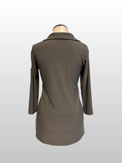 Brown coat on a mannequin against a white background