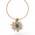 Gold necklace with a floral pendant featuring a blue gemstone on a white background