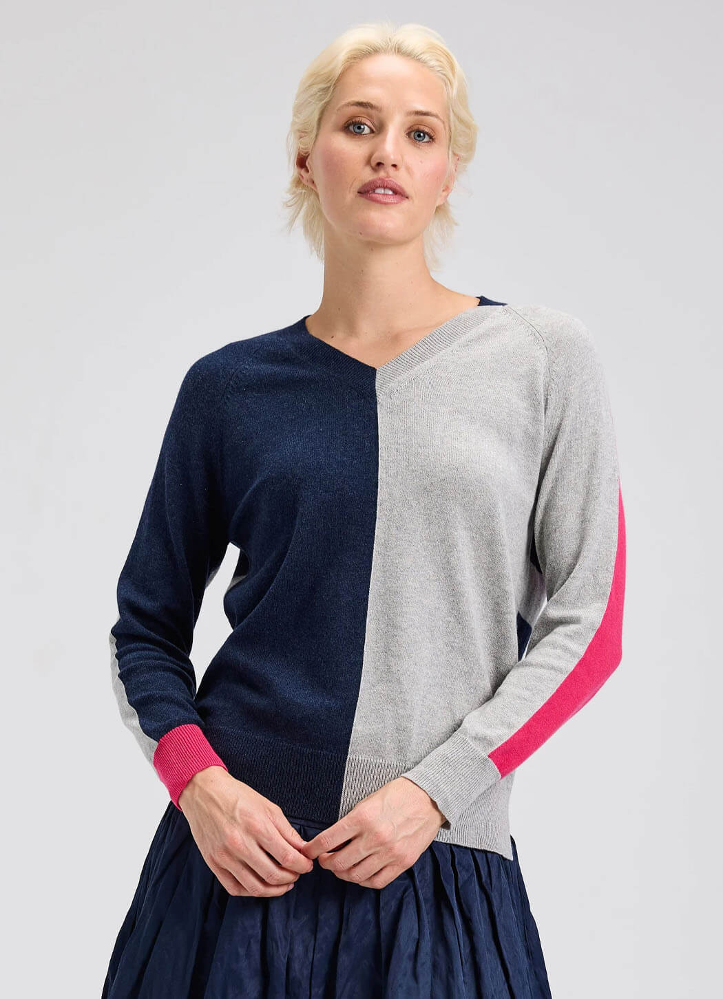 Zaket &amp; Plover V-neck sweater in denim, featuring a soft knit fabric and classic fit, displayed on a neutral background.
