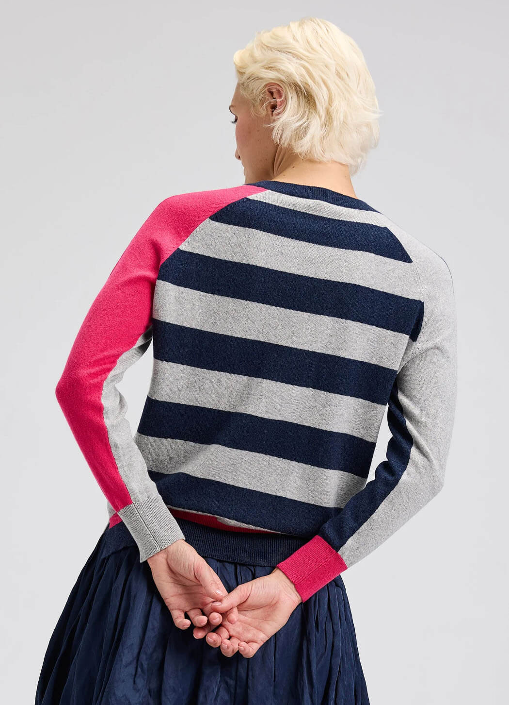Zaket &amp; Plover V-neck sweater in denim, showcasing a close-up of the soft knit fabric and classic fit.