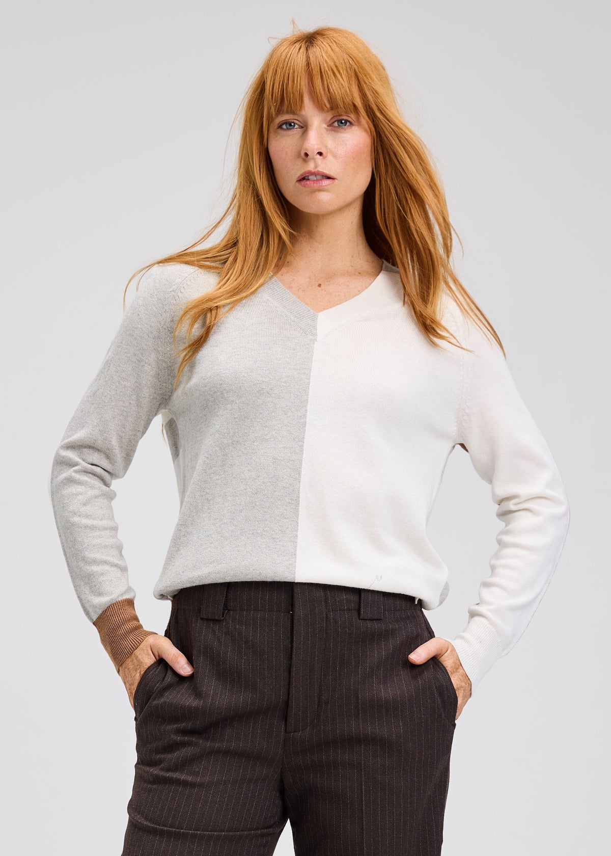 Zaket &amp; Plover V-neck sweater in soft knit fabric, shown in a neutral color, featuring a classic fit and ribbed cuffs.