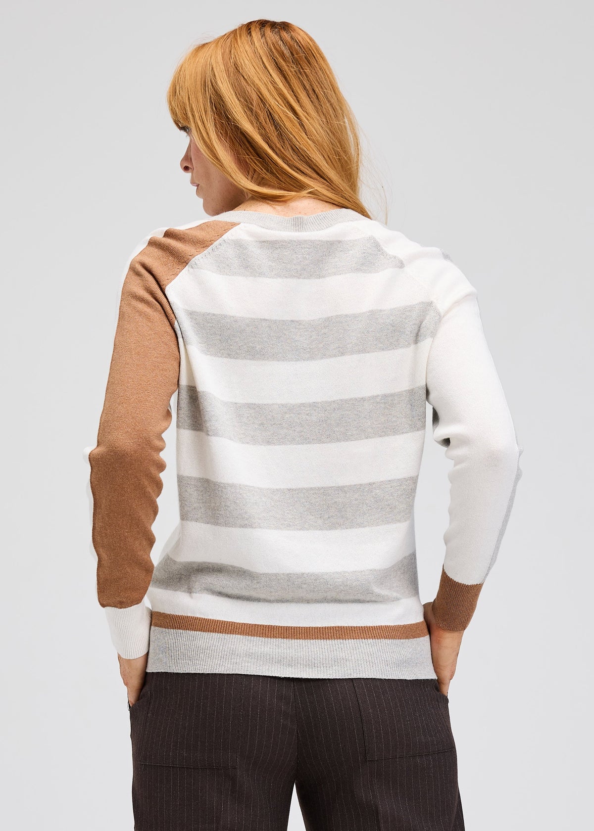 Zaket &amp; Plover V-neck sweater in soft knit fabric, shown in classic fit with ribbed cuffs and hem, in a neutral color.