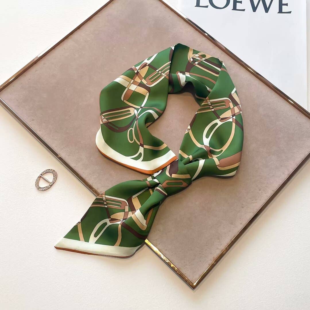 Green WINDING RIVER stirrup loop scarf with a stylish, textured design, perfect for adding a pop of color to your outfit.