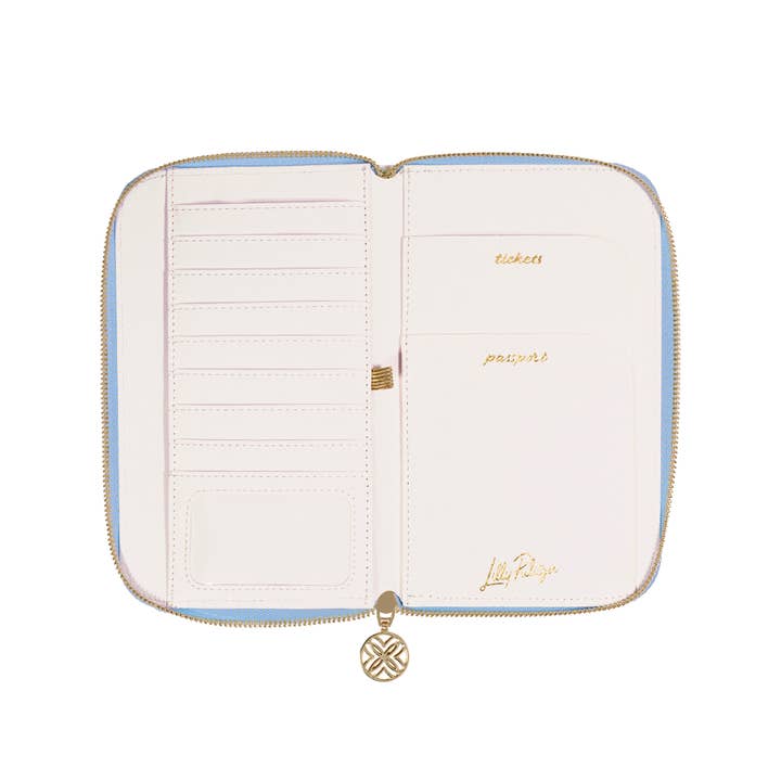 Lilly Pulitzer travel wallet with bamboo logo trellis pattern, slim design, and multiple card slots for organized travel essentials.