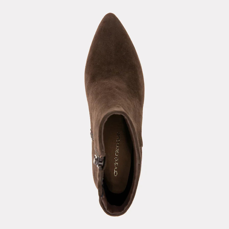 Brown suede ankle boot on a light gray background