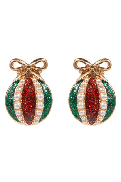 Pair of christmas earrings with red, green, and pearl design on a white background