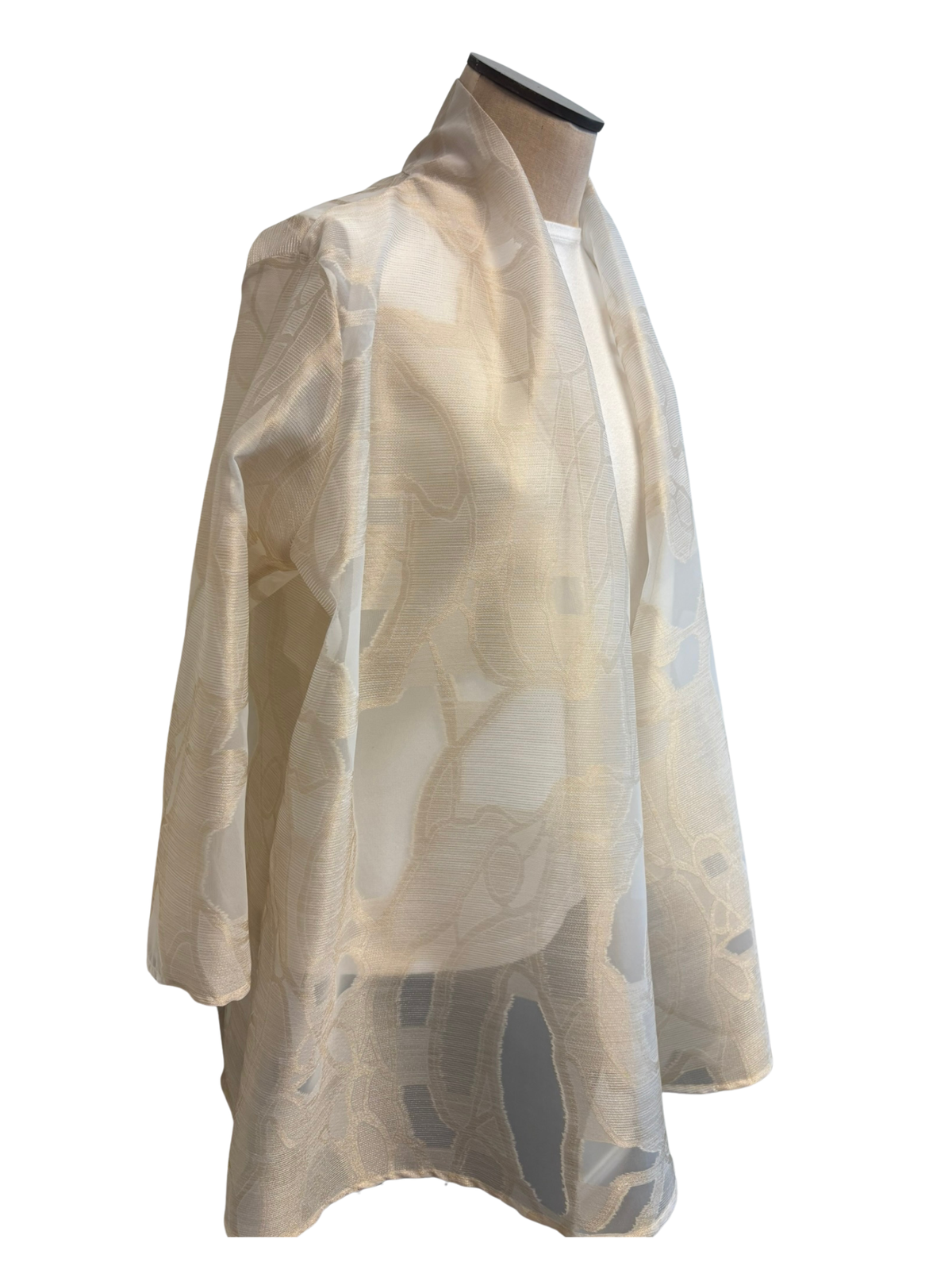 Cream Caroline Rose swing cardigan with shear elevated design, showcasing soft knit fabric and relaxed fit.