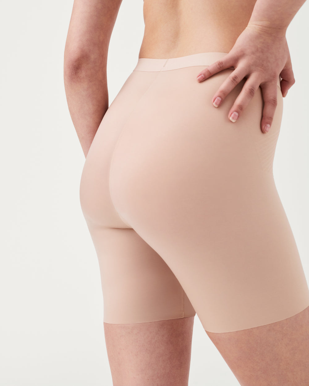 Spanx Invisible Girlshort lingerie in lightweight, seamless fabric, designed for smooth, invisible undergarment coverage.