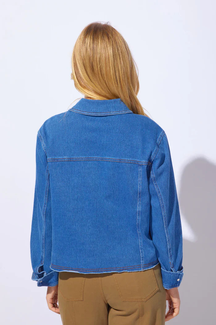 Blue wash ESCAPE BY HABITAT Denim Momentum Resort Jacket displayed on a hanger with front view and casual style.