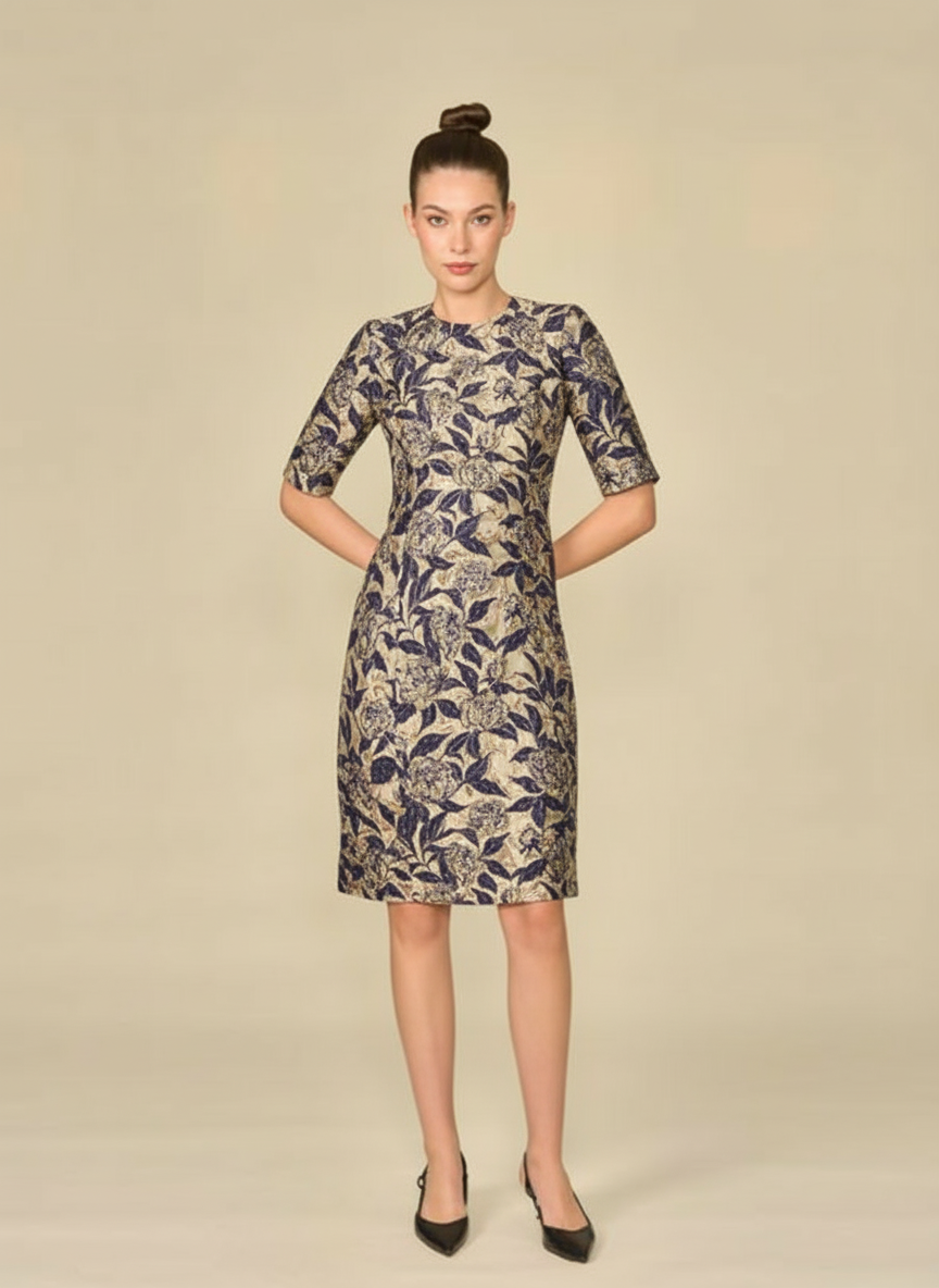Cream-colored formal dress with elbow-length sleeves from Bigio Collection, elegant shift style perfect for special occasions.
